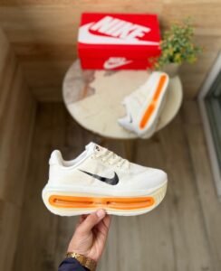 Vomero Premium Boys’ Sneakers in White with Orange Accents (2)