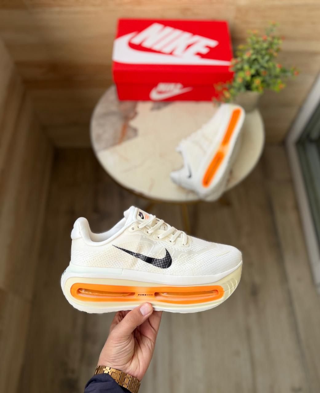 Vomero Premium Boys’ Sneakers in White with Orange Accents (2)