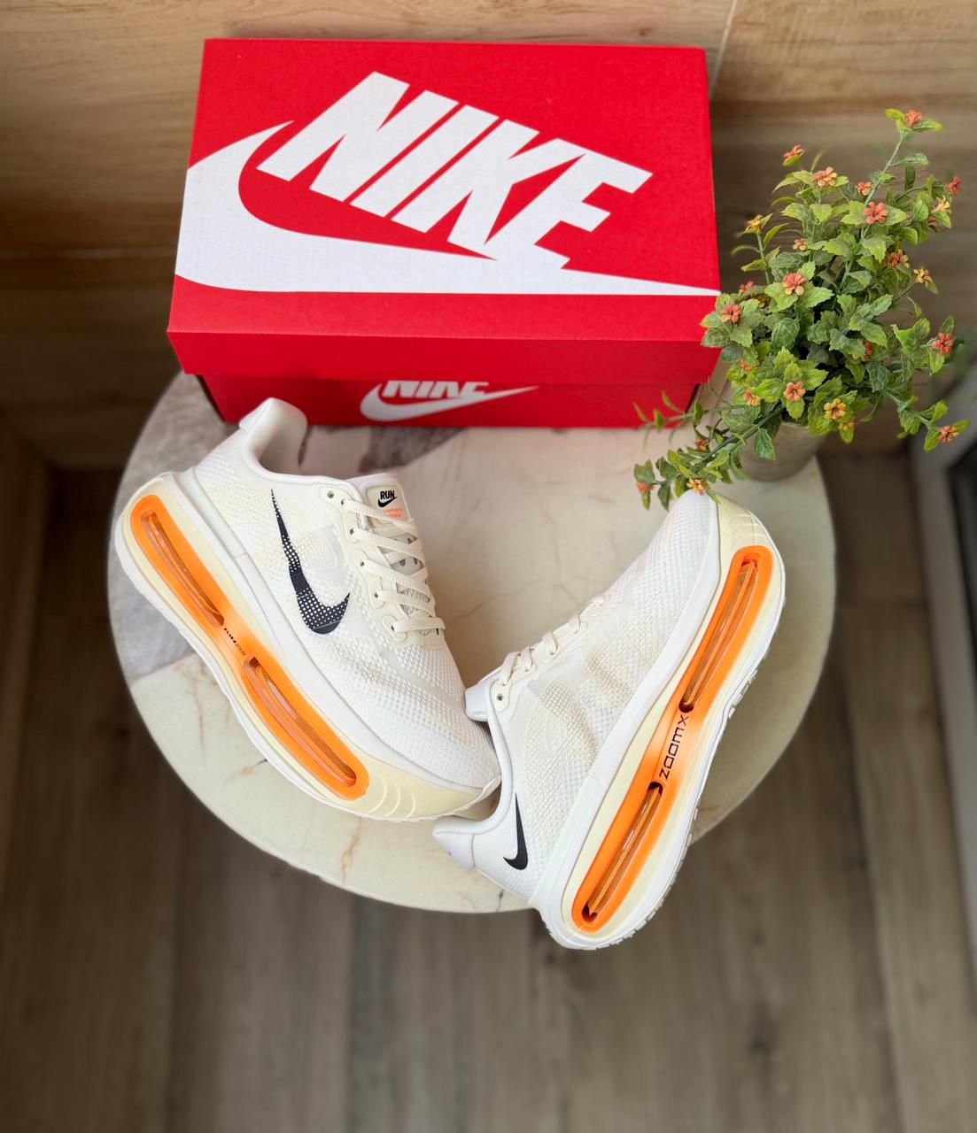 Vomero Premium Boys’ Sneakers in White with Orange Accents (3)