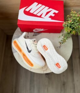 Vomero Premium Boys’ Sneakers in White with Orange Accents (4)