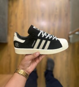 Reign Champ Suede Superstar Sneakers – Classic Collaborative Style