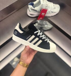 Reign Champ Suede Superstar Sneakers – Classic Collaborative Style